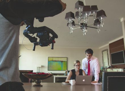 tv commercial being photographed with man and woman actors