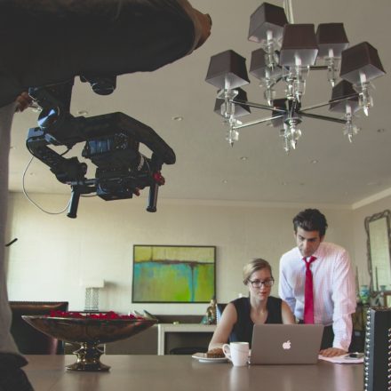 tv commercial being photographed with man and woman actors